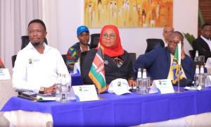 Kenya’s Sports Cabinet Secretary Ababu Namwamba (left) and his Zanzibar counterpart Tabia Maulid Mwita , and Uganda's Head of Delegation , Rodgers Byamukama, who is  an Executive Member , Federation of Uganda Football ( FUFA) following proceedings on 7th, November, 2023   at the joint stakeholders meeting during the East Africa Pamoja AFCON’27 in Diani.